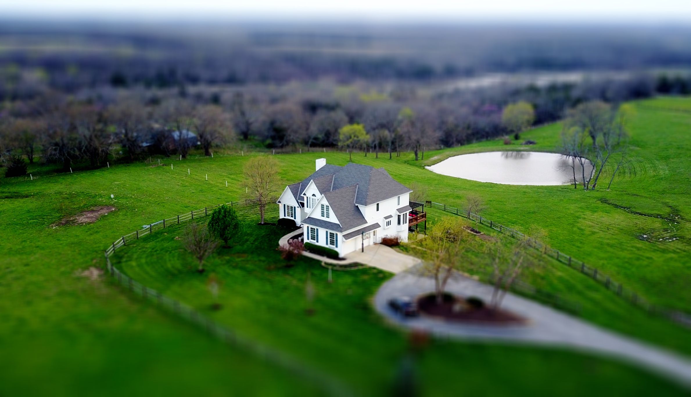 A family home on open land, the kind of asset an estate plan is built to protect